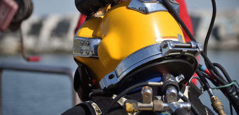 Commercial,Diver,With,A,Helmet
