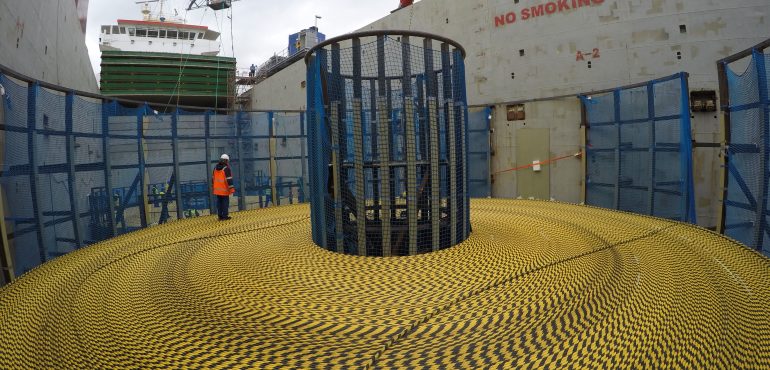Submarine,Cable,Loading,To,Freighter,Vessel